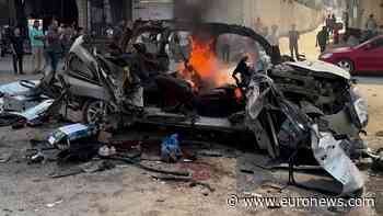 Israeli strike on Gaza vehicle kills two Hamas engineers, 13 wounded