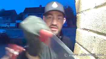 Moment thug is caught on doorbell camera threatening elderly woman with knife after she filmed him fly-tipping