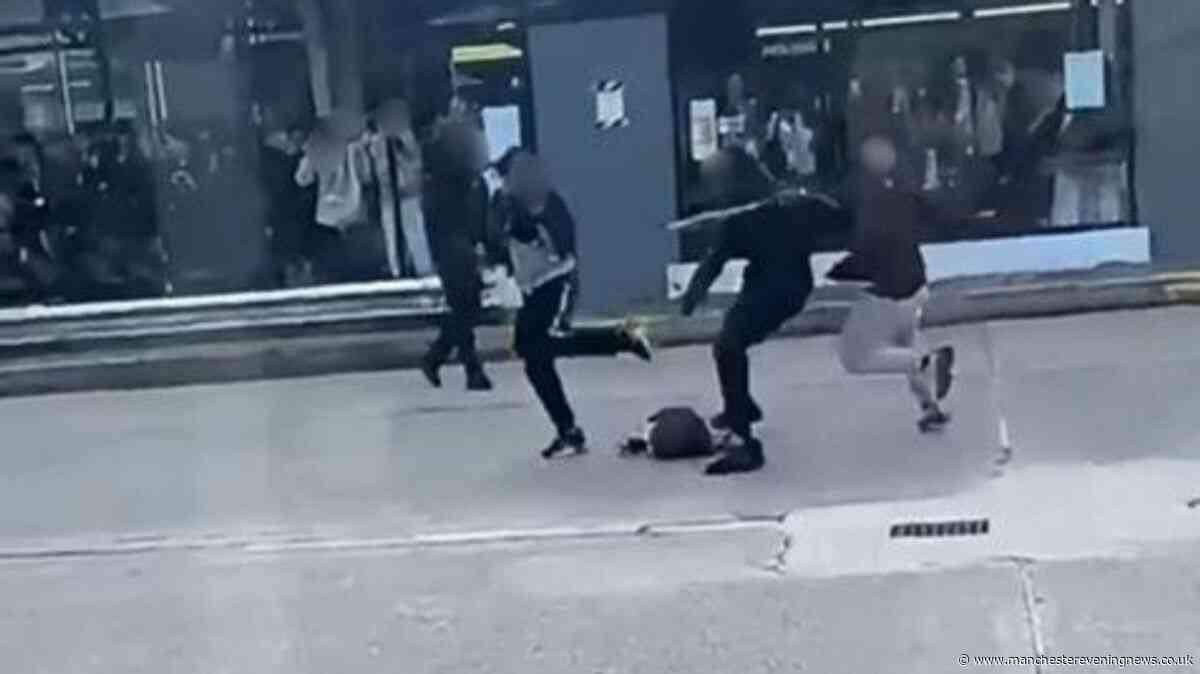 Mass brawl involving 15 people breaks out at Bury interchange with two arrested