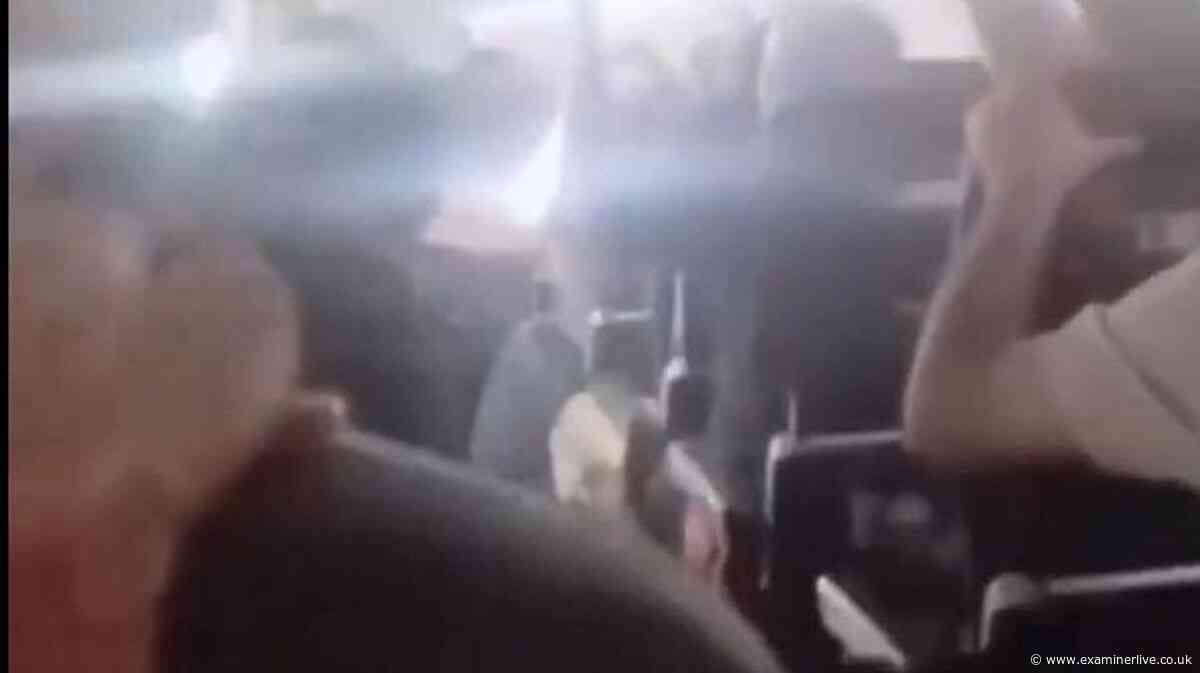 Passengers scream in panic as plane ceiling collapses during emergency landing in Iran