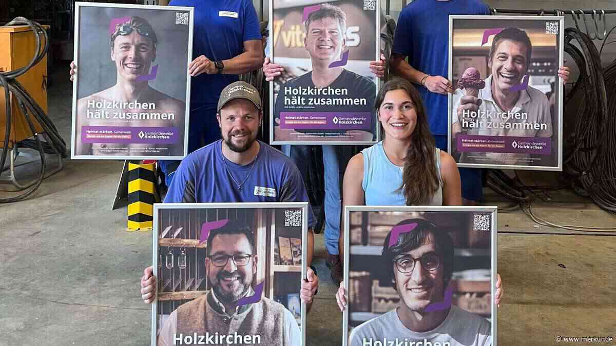 Gemeindewerke kleben Porträts auf 25 Stromkästen
