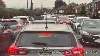 'Horrific double-parking' blamed as 'woman and two kids' involved in crash