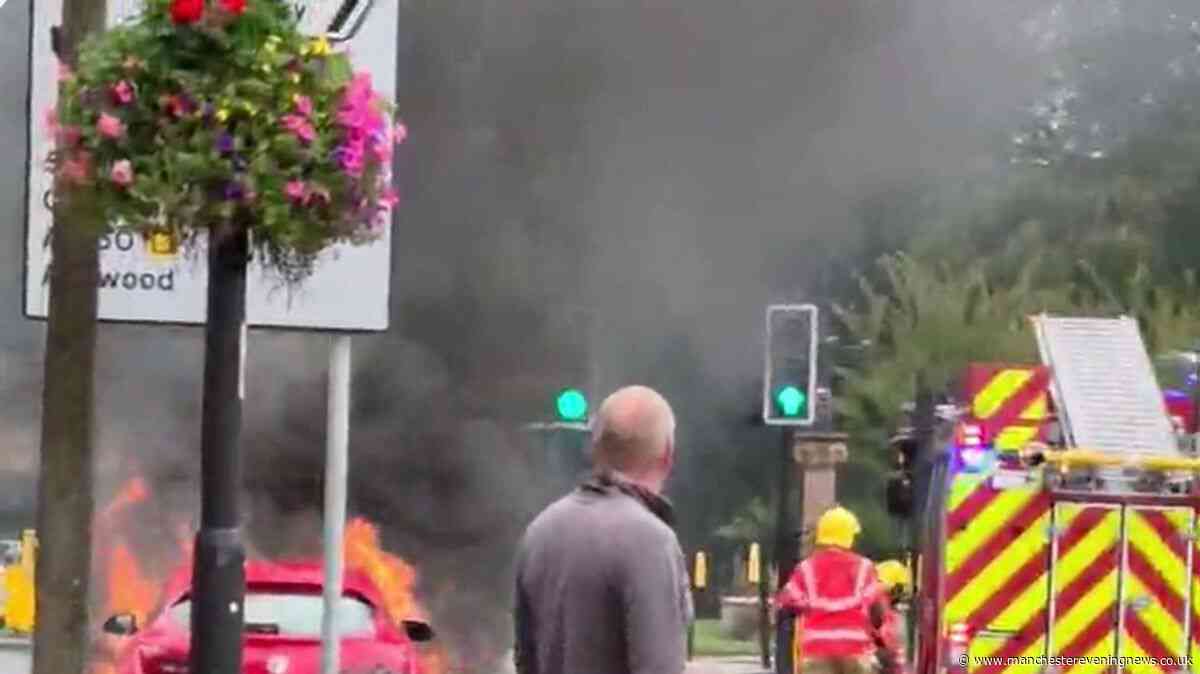 Firefighters rush to Cheadle high street after car bursts into flames
