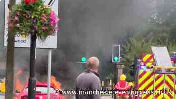 Firefighters rush to Cheadle high street after car bursts into flames