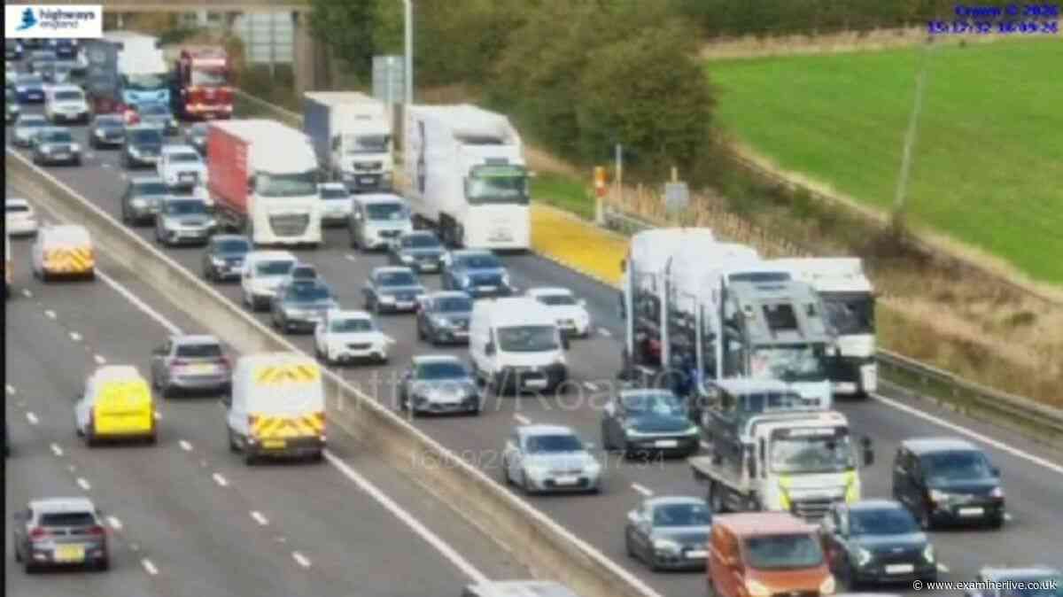 M1 all traffic held LIVE as crash causes long delays