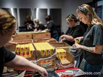 Photo gallery: Louisville Title employees pack meals for Connecting Kids to Meals