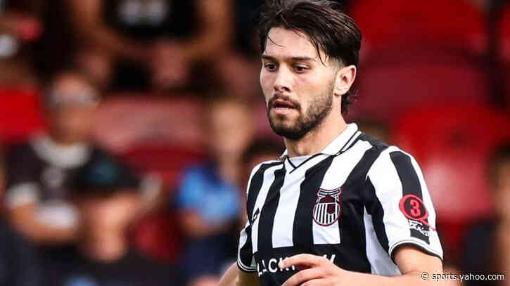 Grimsby midfielder Turi signs new deal