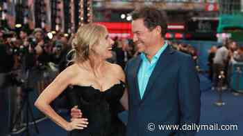 Sienna Miller wows in a black feathered dress as she joins co-star Dominic West at the WAR premiere four months after giving birth