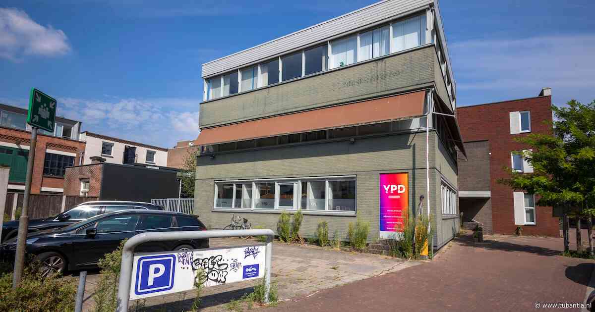 Ophogen en omvormen kantoorpand in Enschede in luxe appartementen mag