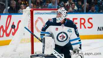 Jets suspend star goalie Hellebuyck after training camp no-show