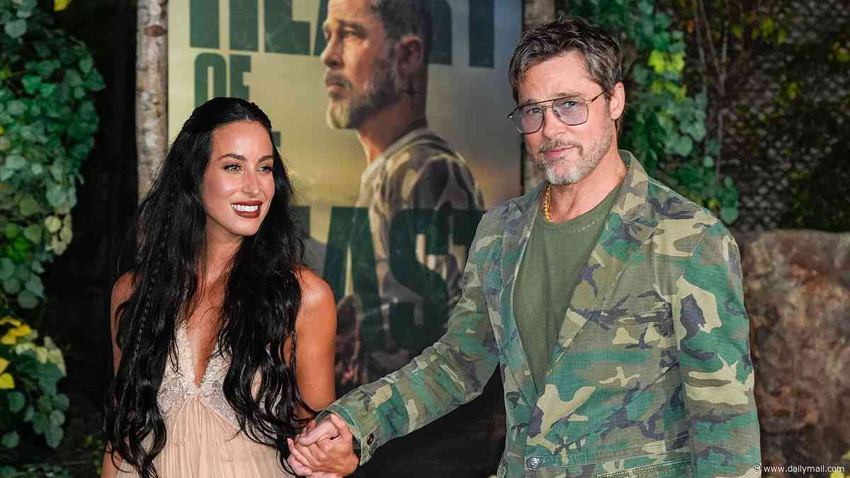 Brad Pitt and Ines de Ramon look loved-up at Heart of the Beast premiere... after ANOTHER of his kids with Angelina Jolie dropped his name