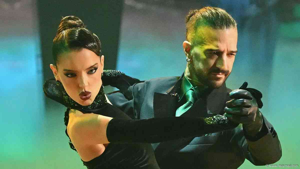 Maura Higgins' triumphant DWTS debut: Star is supported by her castle co-stars Rob Rausch and Lisa Rinna as she tops the leaderboard with Traitors-inspired foxtrot amid 'fix' claims