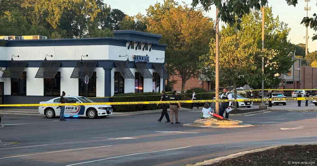 Man charged with murder in fight-turned-shooting inside fast food restaurant
