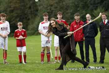 William and Kate get to grips with shinty during visit to Bute