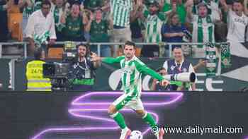 Cheered on by his stunning girlfriend, Troy Parrott's La Liga career has burst into life and his goal against Real Madrid has already had THIS astonishing impact in his new hometown of Seville...