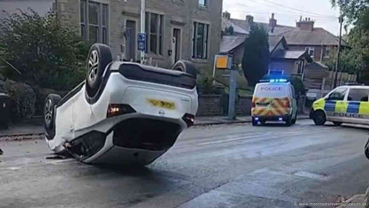 Driver escapes serious injury after car flips onto roof in crash