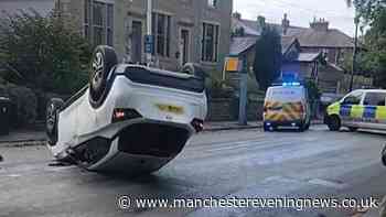 Driver escapes serious injury after car flips onto roof in crash