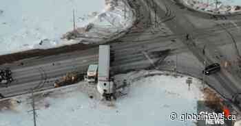 Ontario transport truck driver charged in collision with ambulance in Madoc