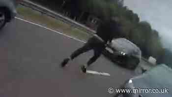 Moment man drives on wrong side during police chase before running into A-road