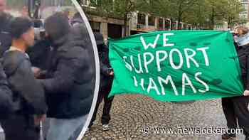 Ongeregeldheden op de Dam tijdens landelijke Isra&euml;l-manifestatie, demonstranten met &rsquo;We support Hamas'-spandoek