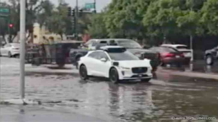 Video shows Waymo driverless vehicle stuck in 'AI loop' on flooded Phoenix street