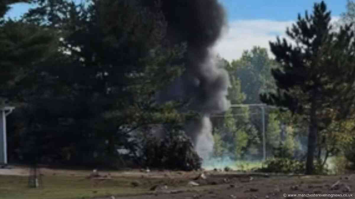 F-16 fighter jet crashes and pilot 'parachutes' from plane