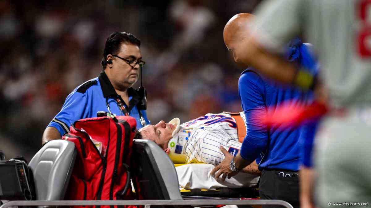 Mets' Jared Young carted off field after colliding with Nolan McLean during play at first base