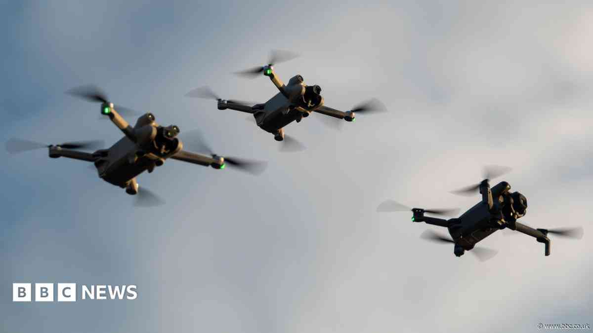 Soldiers and students study drone technology together