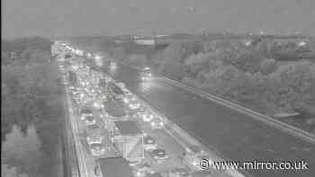 M1 Nottingham live: Standstill traffic as lorry overturns and 'crashes into central barrier'