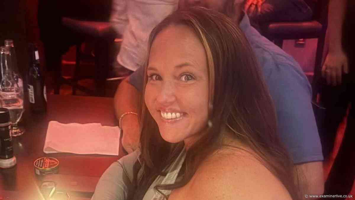 Mum beams in mugshot after 'caught having sex with family dog by husband'