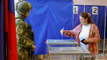 Russians begin voting in parliamentary election set to cement Kremlin's power