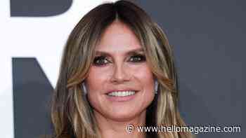 Heidi Klum is supported by lookalike model children with striking family gathering