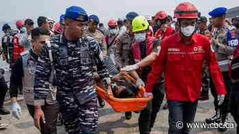 Indonesian divers recover 3 bodies from capsized ferry as salvage operation begins
