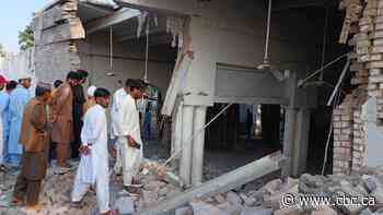 At least 21 killed in Pakistan mosque bombing near police station