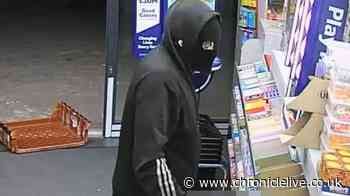 Footage shows terrifying moment armed robber threatens staff at North East shop