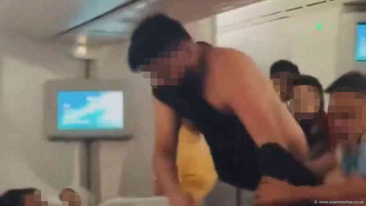 Man's shirt ripped open as brutal brawl breaks out on flight to London