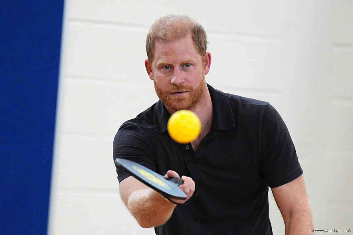 Harry plays pickleball with children as controversy continues to cloud royals