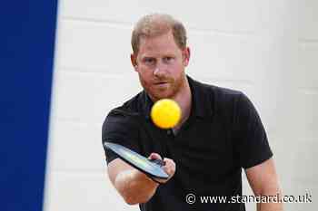 Harry plays pickleball with children as controversy continues to cloud royals
