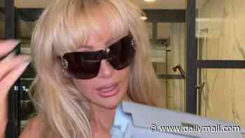 Olivia Attwood shows off £20,000 Hermes clutch bag her boyfriend Pete Wicks got her as she poses in Margot Robbie's lingerie