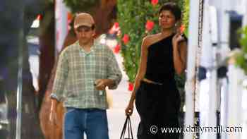 Zendaya steals the spotlight from VERY casual husband Tom Holland in ab-flashing designer look... after loved-up Emmys display