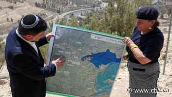 Israel moving ahead with settlement plans that would split West Bank in two, rights group says