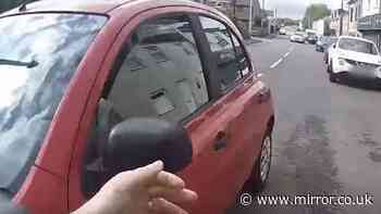 Woman asks cop 'where to?' as she gives him lift in car to catch suspect on the run