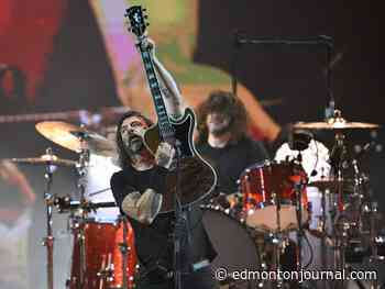 Concert review: Foo Fighters and Queens of the Stone Age ablaze at Commonwealth Stadium
