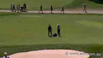 Star forced to find help after caddie quits