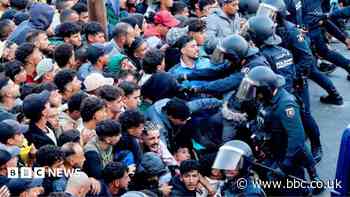 Shots heard as police start moving migrants from Ceuta beaches