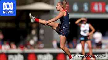 Demons claim top spot as Cats maintain winning ways