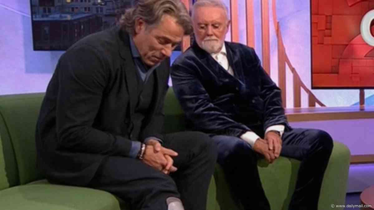 John Bishop makes TV appearance wearing a medical boot as he shares update after breaking his ankle in motorbike crash and cancelling tour