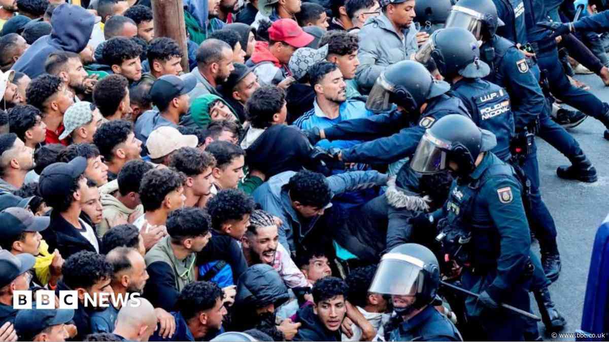 Shots heard as police start moving migrants from Ceuta beaches