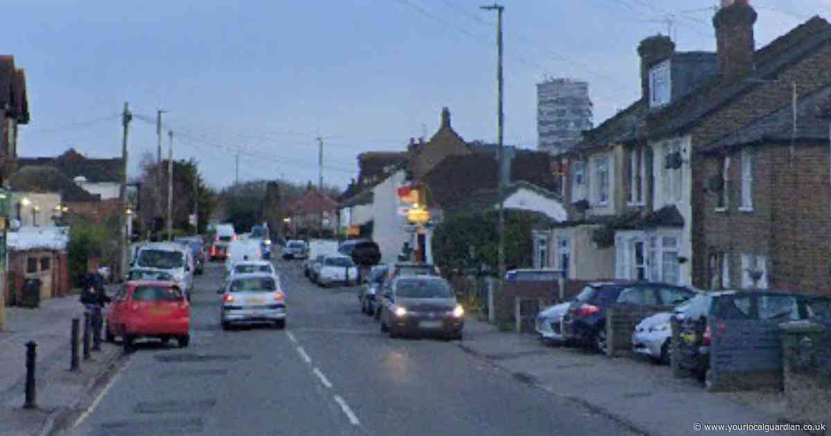 Two in hospital after stabbing at residential address in Surrey town