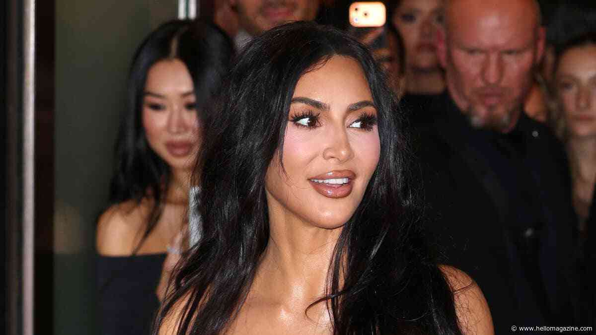 Kim Kardashian sizzles in skin-tight nude dress during London appearance
